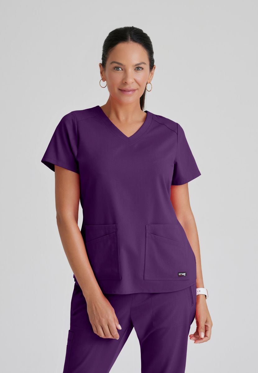 Greys Anatomy Emma 4 pocket, V-neck scrub top with angled seams | Eggplant