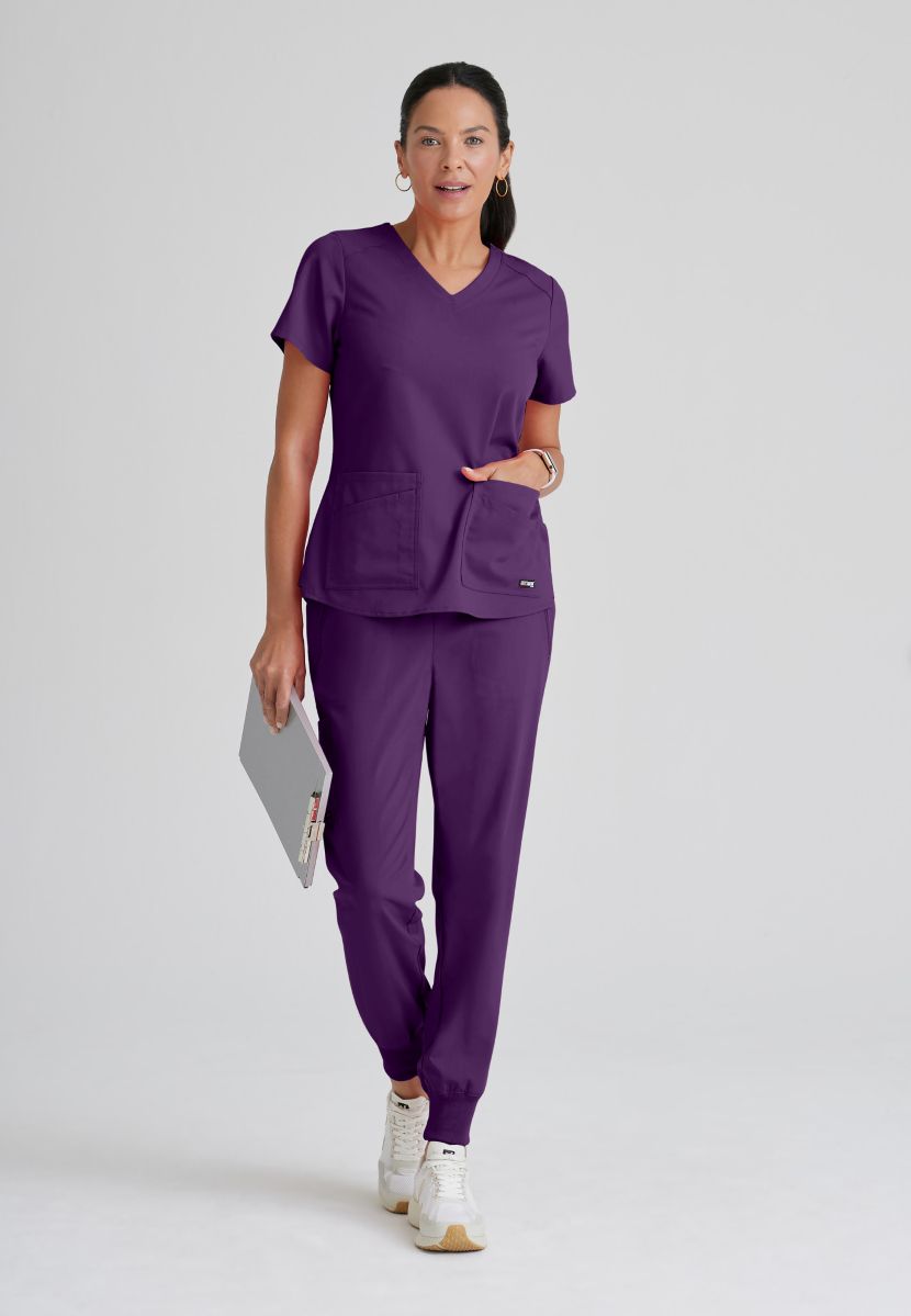 Greys Anatomy Emma 4 pocket, V-neck scrub top with angled seams | Eggplant
