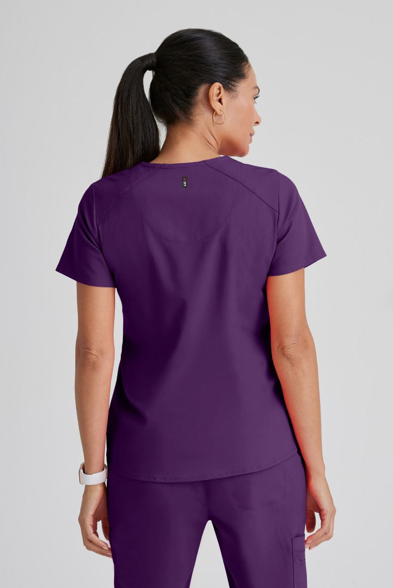 Greys Anatomy Emma 4 pocket, V-neck scrub top with angled seams | Eggplant