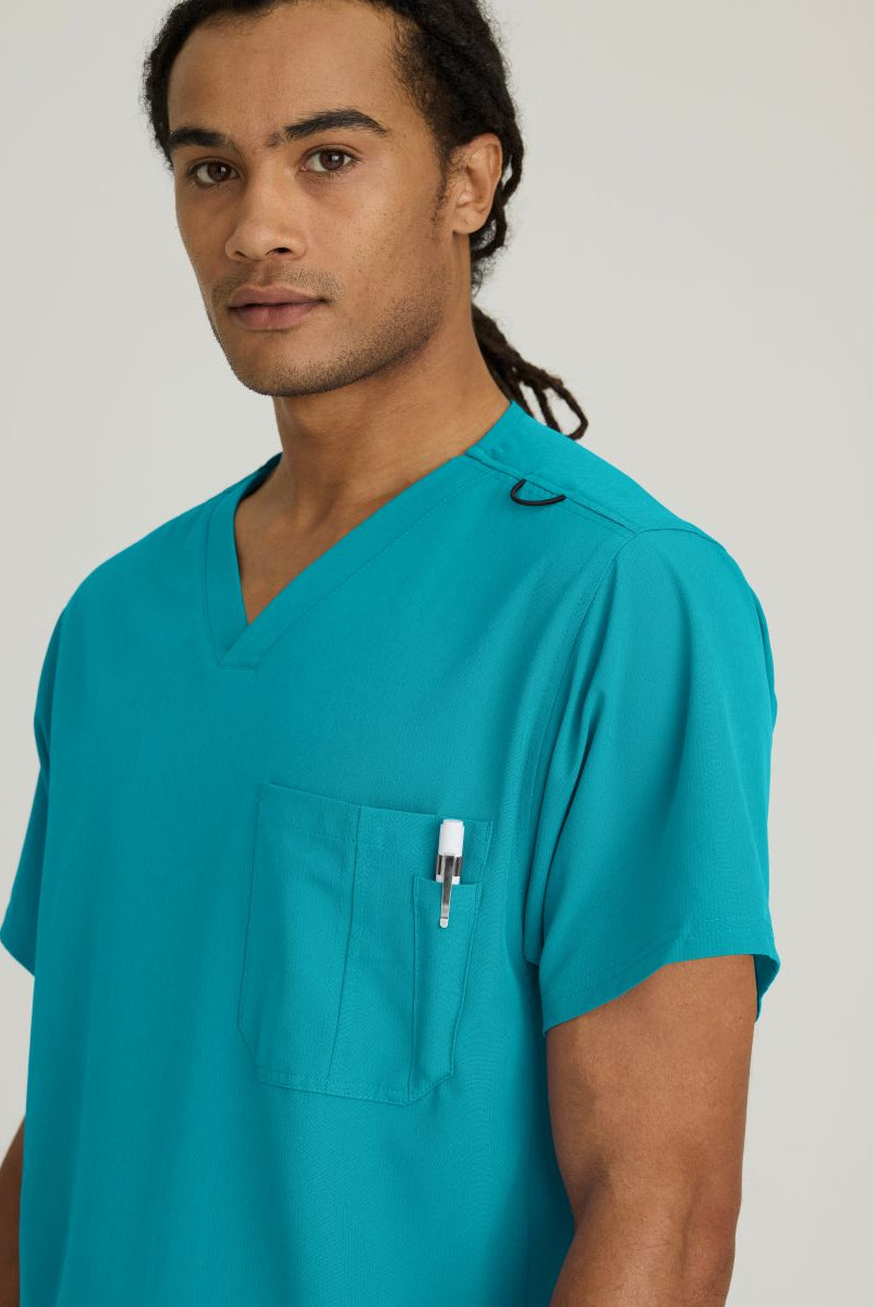 SKECHERS MALE STRUCTURE V-NECK TOP | Teal