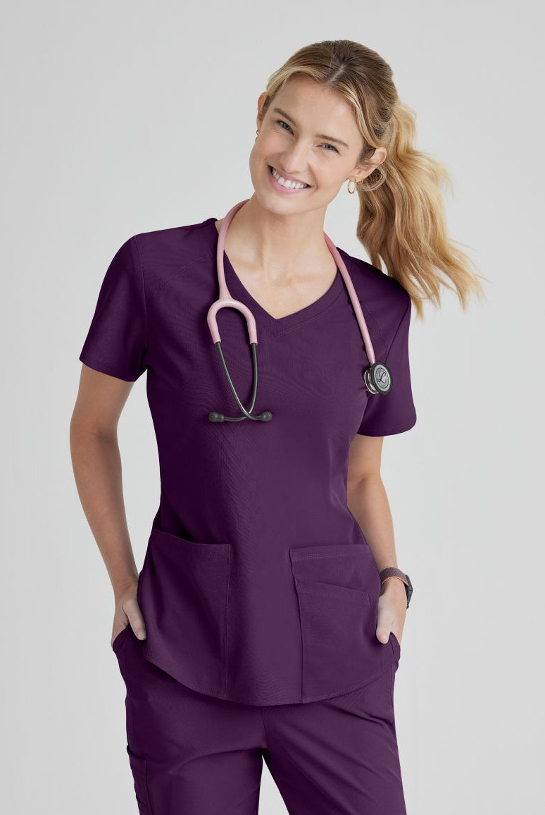 SKECHERS BREEZE 3-POCKET SHAPED HEM TOP | Eggplant