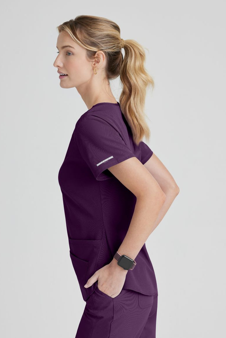 SKECHERS BREEZE 3-POCKET SHAPED HEM TOP | Eggplant