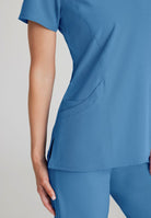 SKECHERS FEMALE RELIANCE 3-POCKET WRAP EFFECT TOP | TRUE CEIL