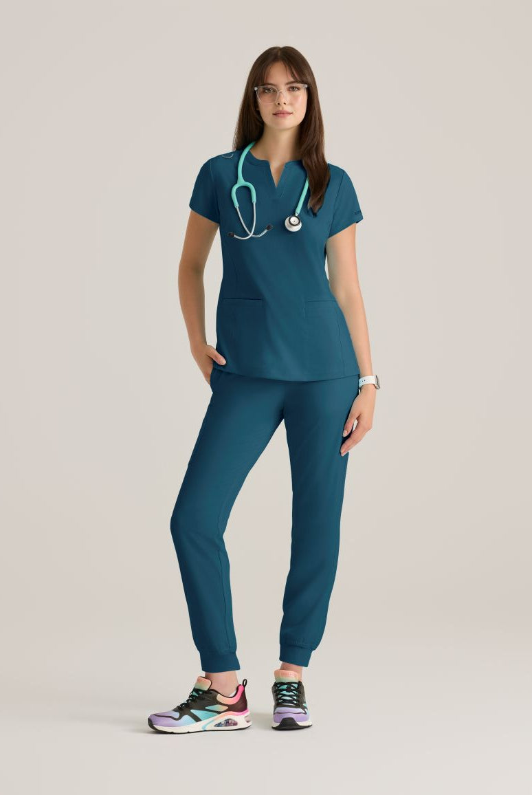 Skechers Women's Coast 2-Pocket Banded Collar Top PRE-ORDER PRODUCT | Bahama / Caribbean