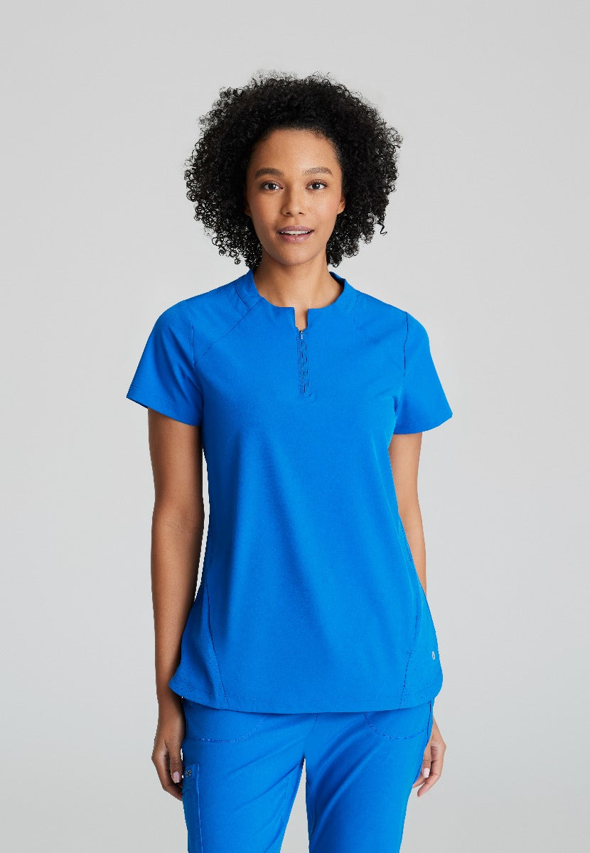 BARCO ONE FLUX FEMALE SCRUB TOP | New Royal