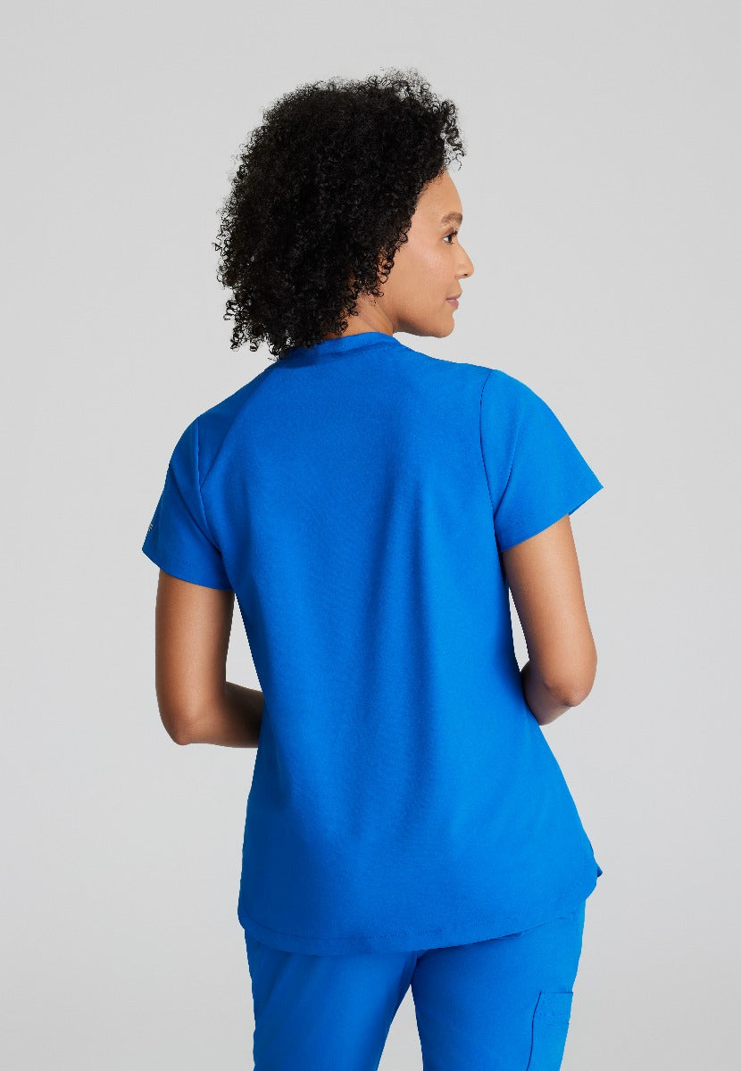 BARCO ONE FLUX FEMALE SCRUB TOP | New Royal