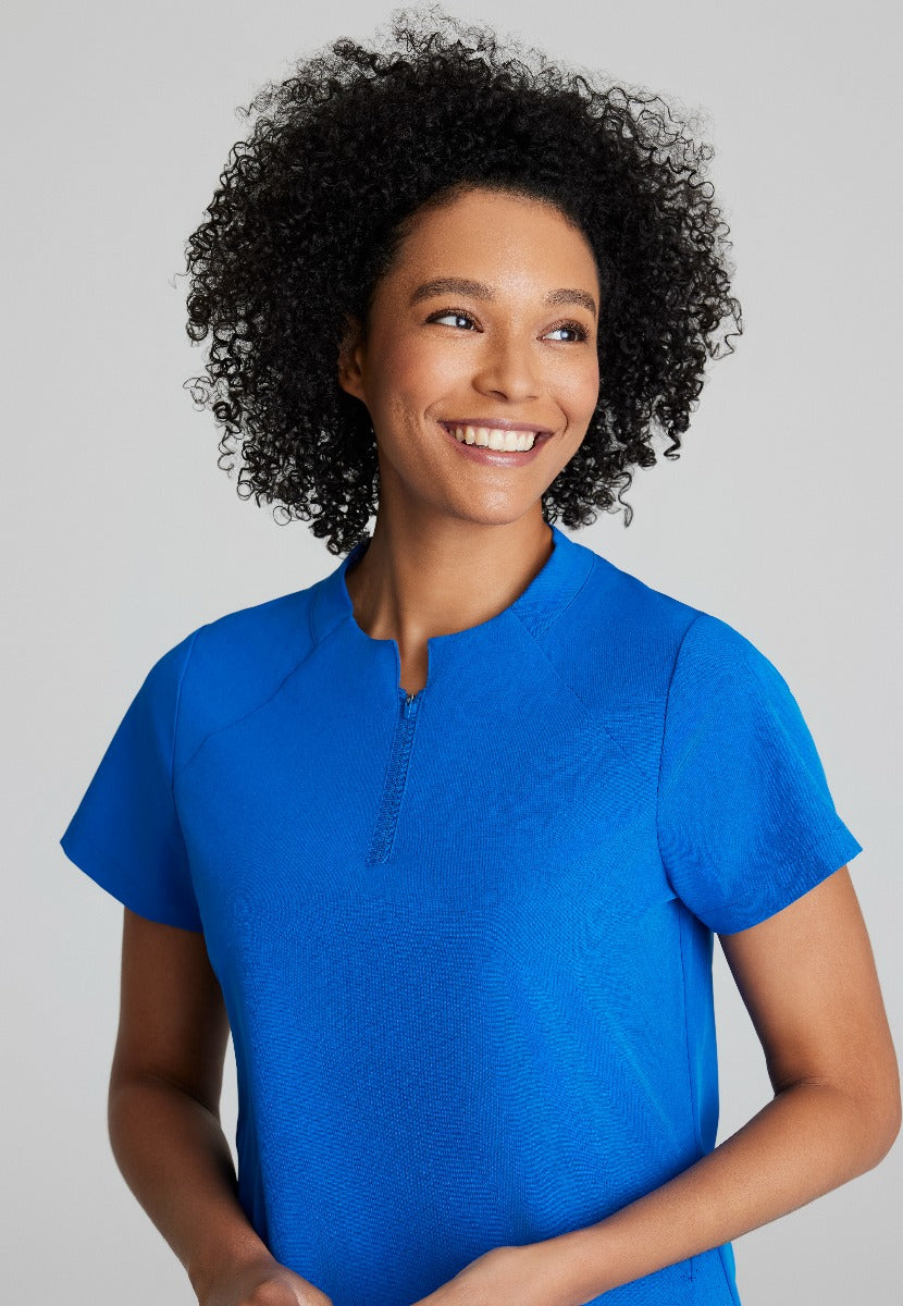BARCO ONE FLUX FEMALE SCRUB TOP | New Royal