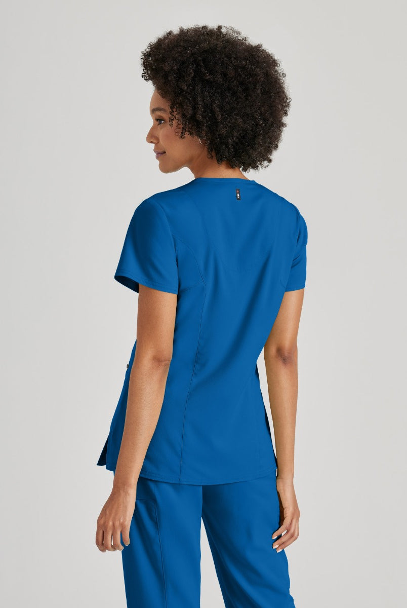 Greys Anatomy V-Neck Kim Top with Zip Front Pocket | New Royal
