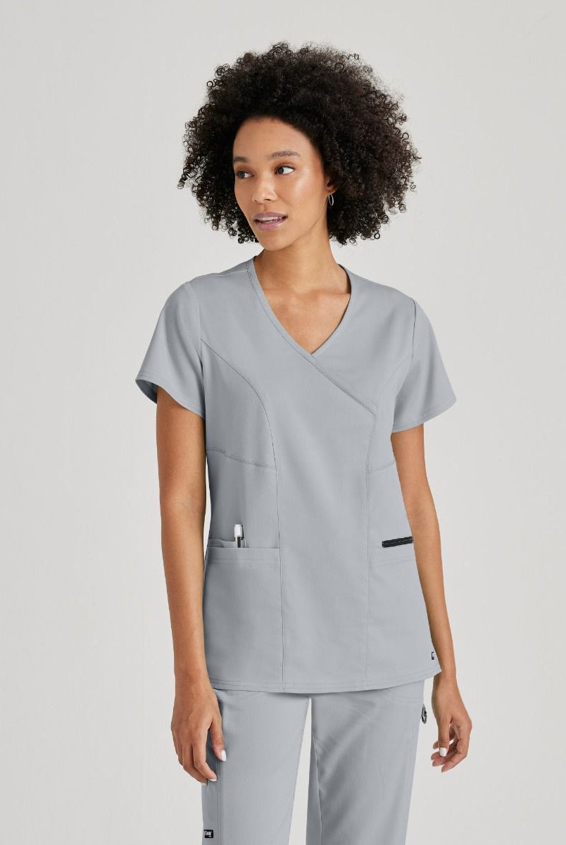 Greys Anatomy V-Neck Kim Top with Zip Front Pocket |  Moonstruck