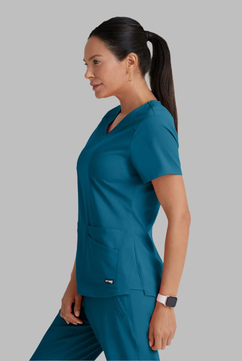 Greys Anatomy Emma 4 pocket, V-neck scrub top with angled seams | Bahama / Caribbean
