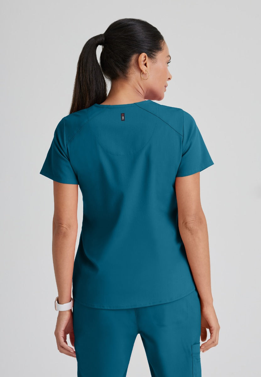 Greys Anatomy Emma 4 pocket, V-neck scrub top with angled seams | Bahama / Caribbean