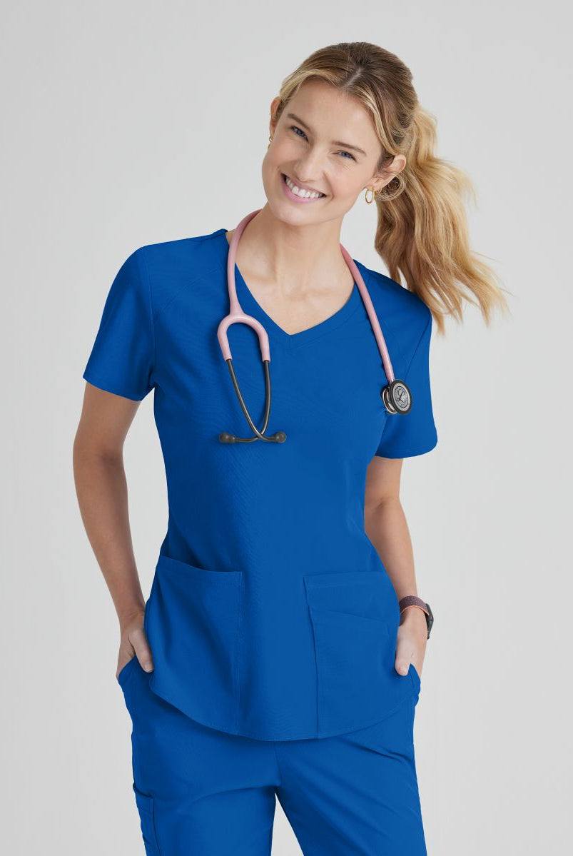 SKECHERS BREEZE 3-POCKET SHAPED HEM TOP | New Royal