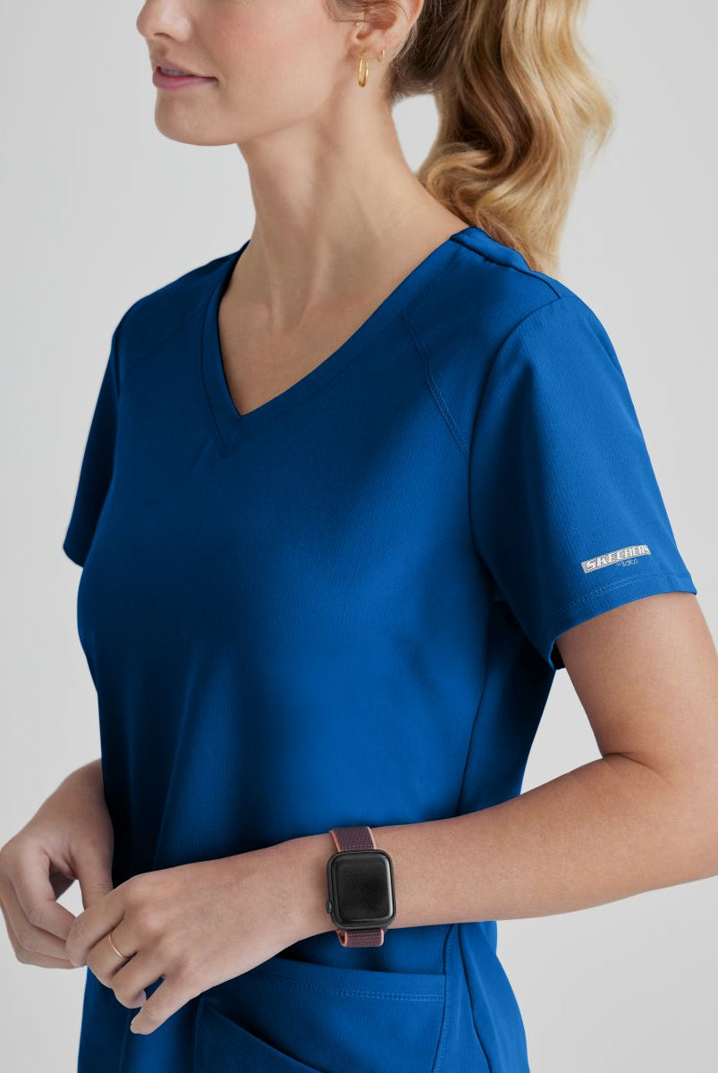 SKECHERS BREEZE 3-POCKET SHAPED HEM TOP | New Royal