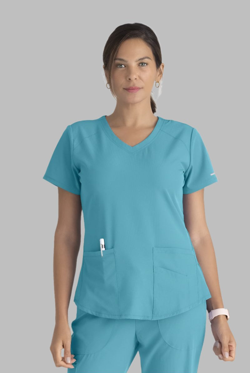 SKECHERS BREEZE 3-POCKET SHAPED HEM TOP | TURQUOISE