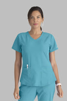 SKECHERS BREEZE 3-POCKET SHAPED HEM TOP | TURQUOISE