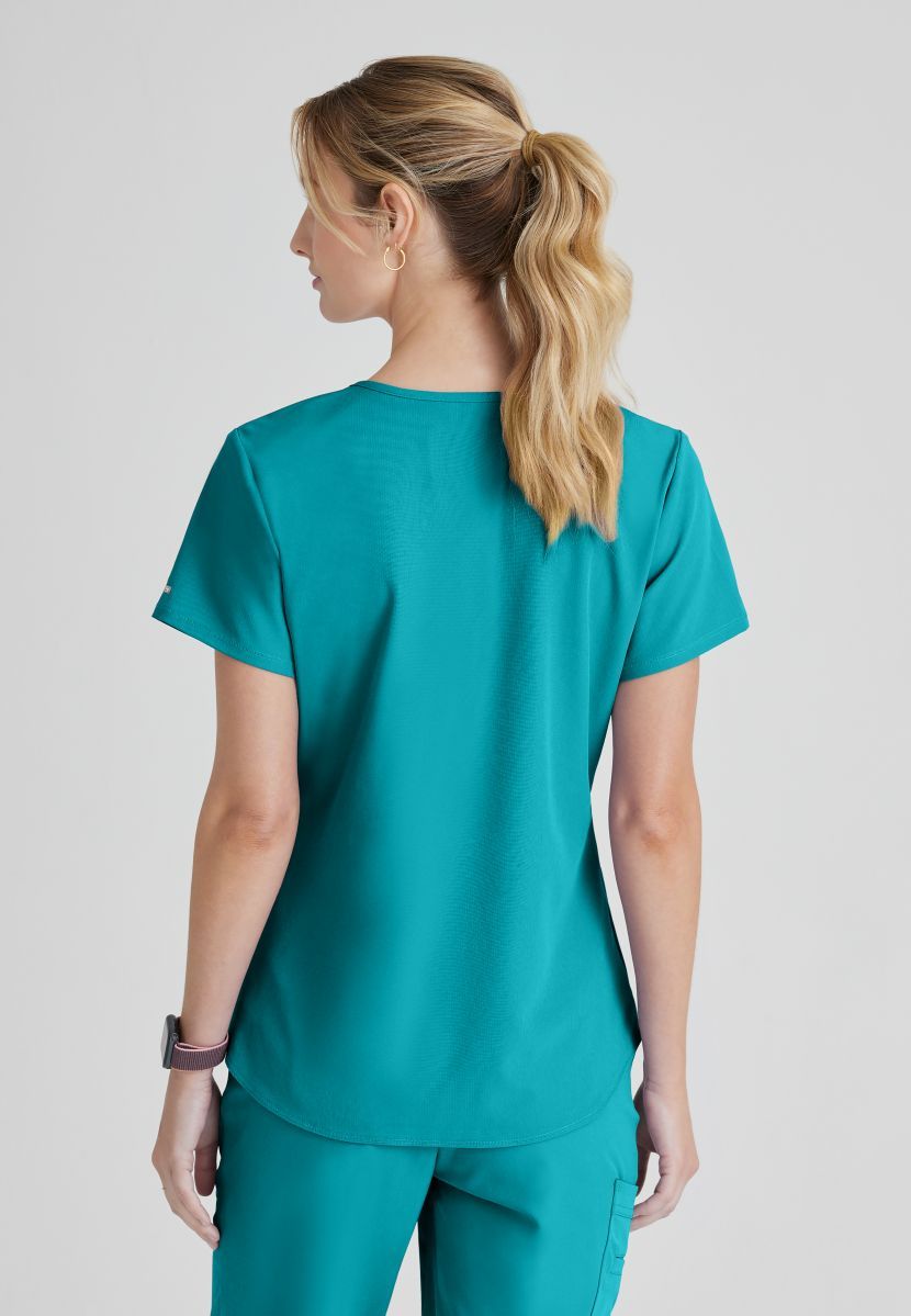 SKECHERS BREEZE 3-POCKET SHAPED HEM TOP | Teal