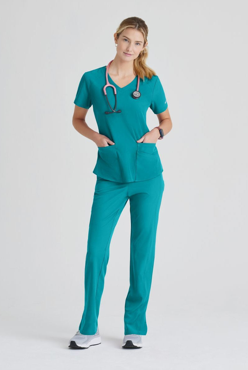 SKECHERS BREEZE 3-POCKET SHAPED HEM TOP | Teal