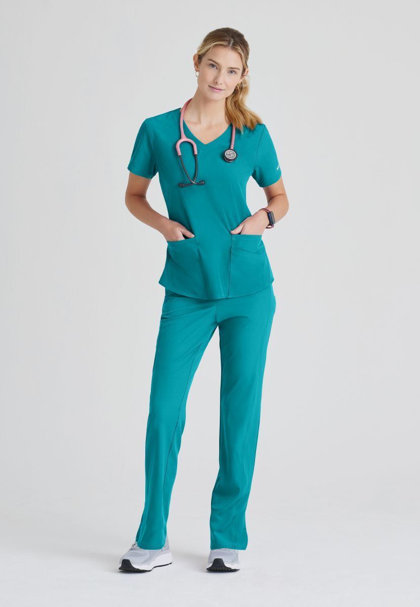 SKECHERS BREEZE 3-POCKET SHAPED HEM TOP | Teal