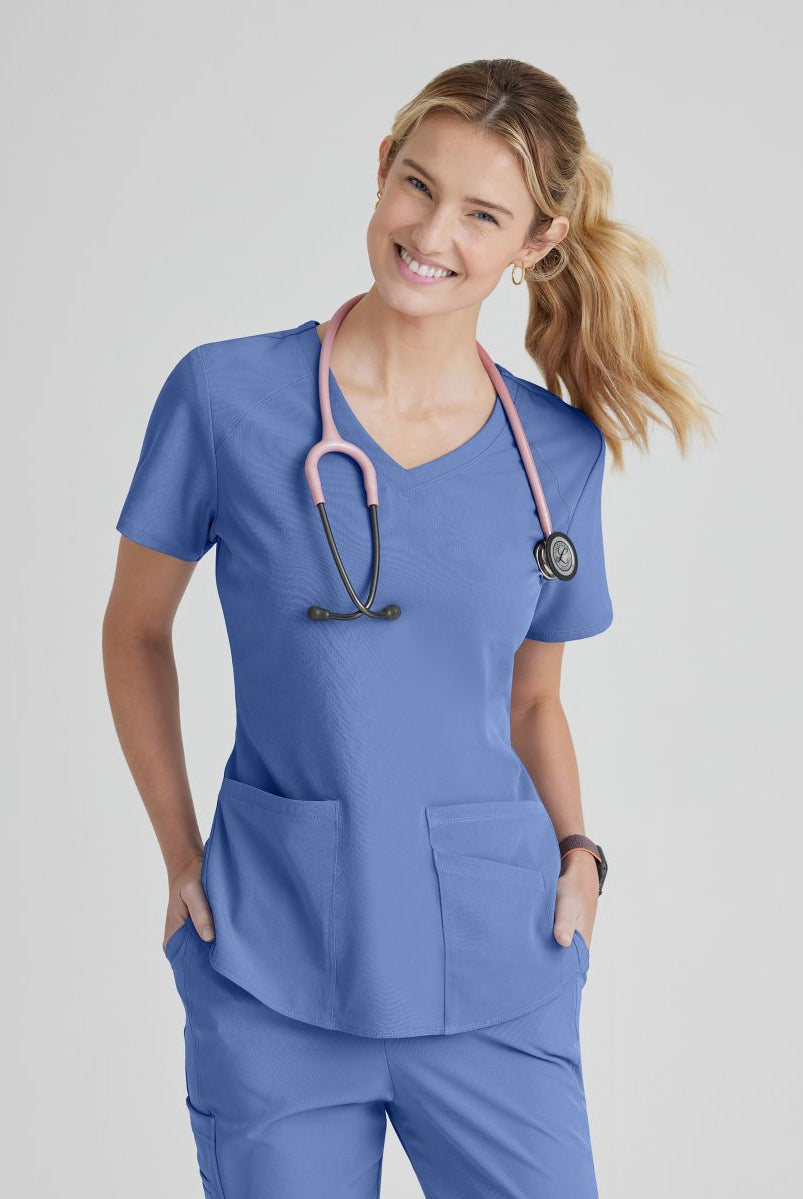 SKECHERS BREEZE 3-POCKET SHAPED HEM TOP | TRUE CEIL