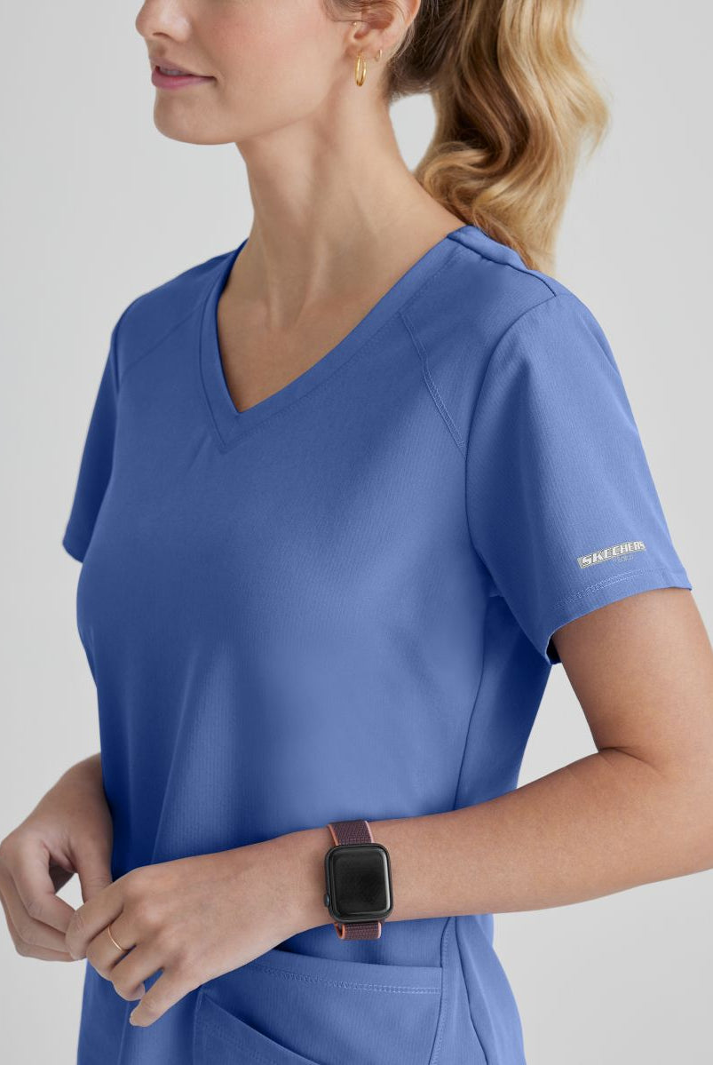 SKECHERS BREEZE 3-POCKET SHAPED HEM TOP | TRUE CEIL
