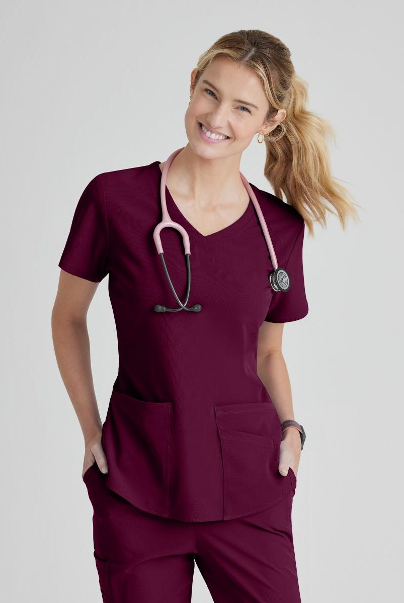 SKECHERS BREEZE 3-POCKET SHAPED HEM TOP | Wine
