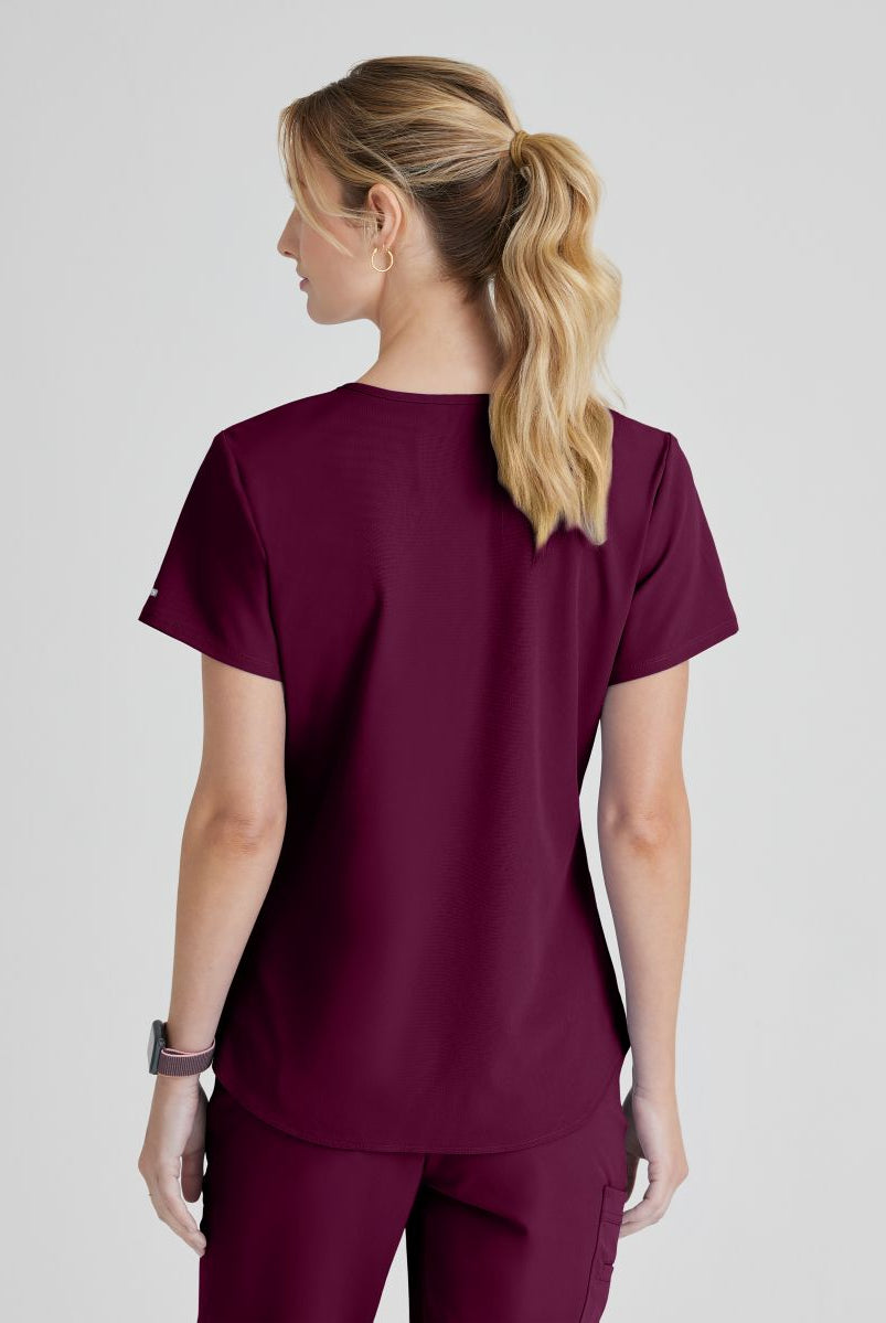 SKECHERS BREEZE 3-POCKET SHAPED HEM TOP | Wine