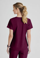 SKECHERS BREEZE 3-POCKET SHAPED HEM TOP | Wine