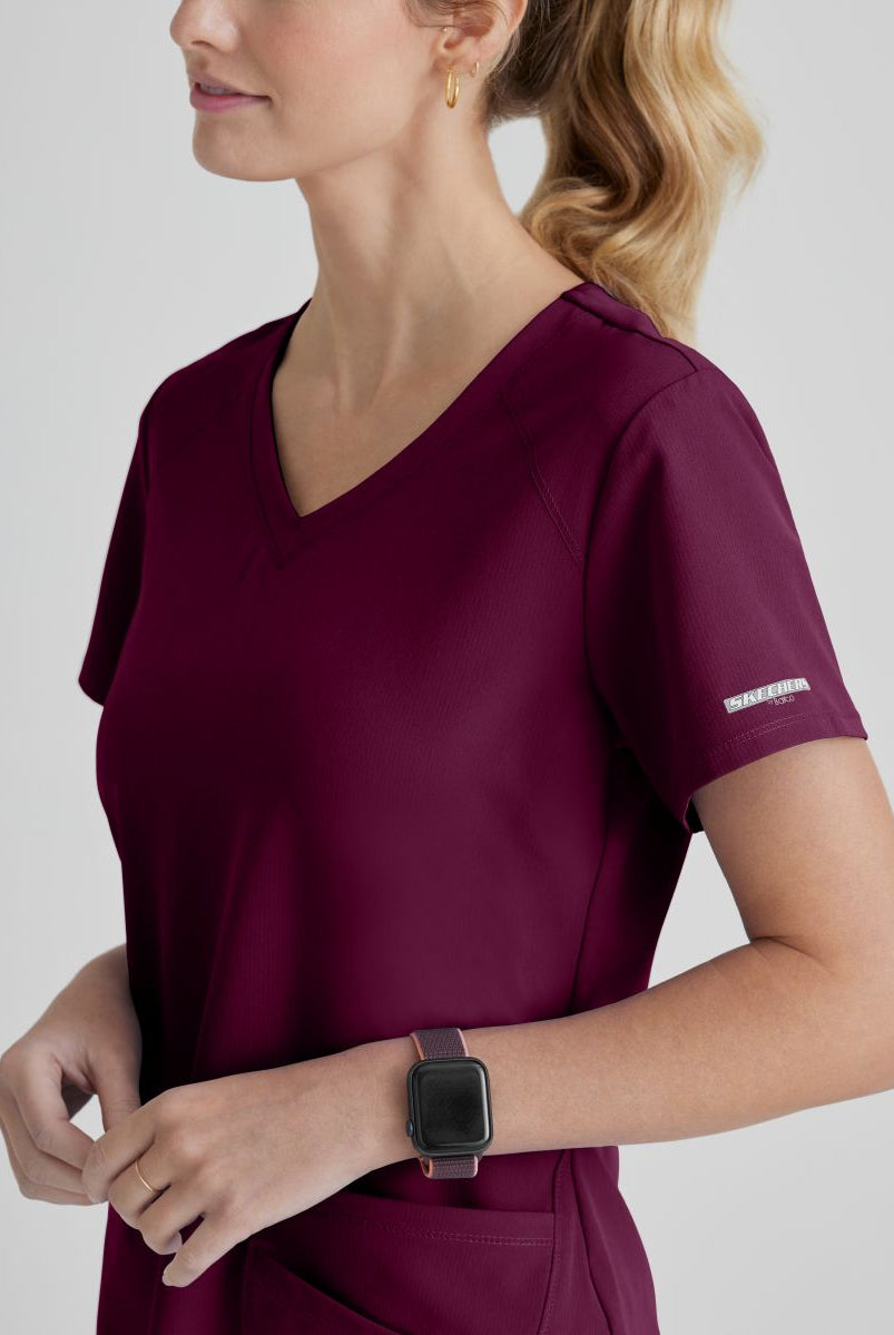 SKECHERS BREEZE 3-POCKET SHAPED HEM TOP | Wine
