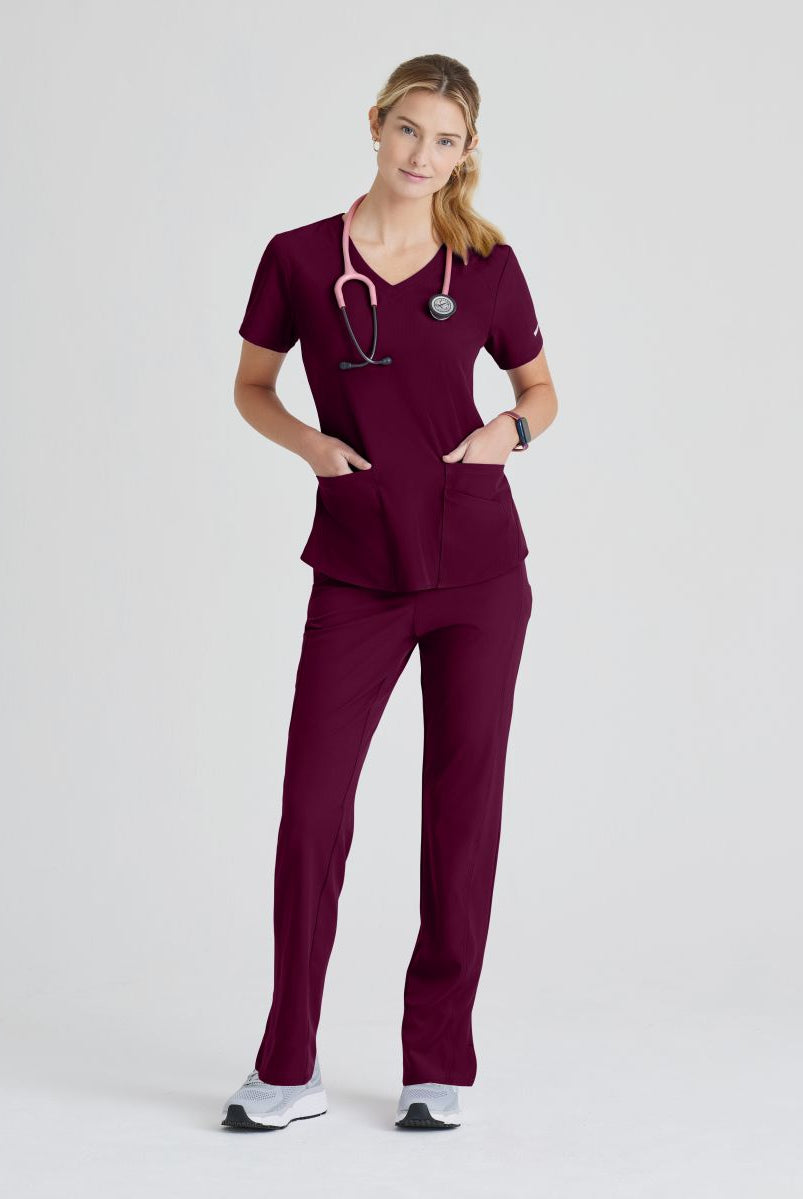 SKECHERS BREEZE 3-POCKET SHAPED HEM TOP | Wine