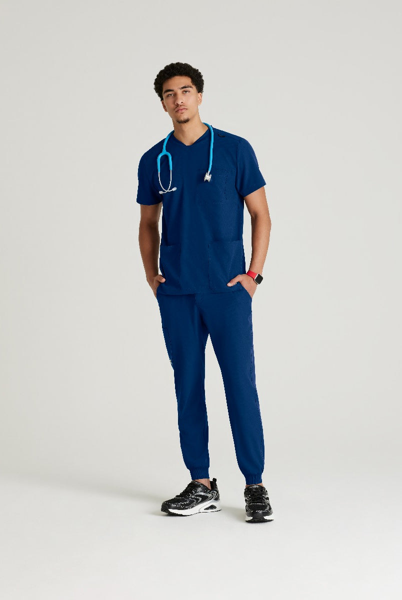 SKECHERS MALE THESIS THREE POCKET, ROUNDED NECKLINE SCRUB TOP  | NAVY