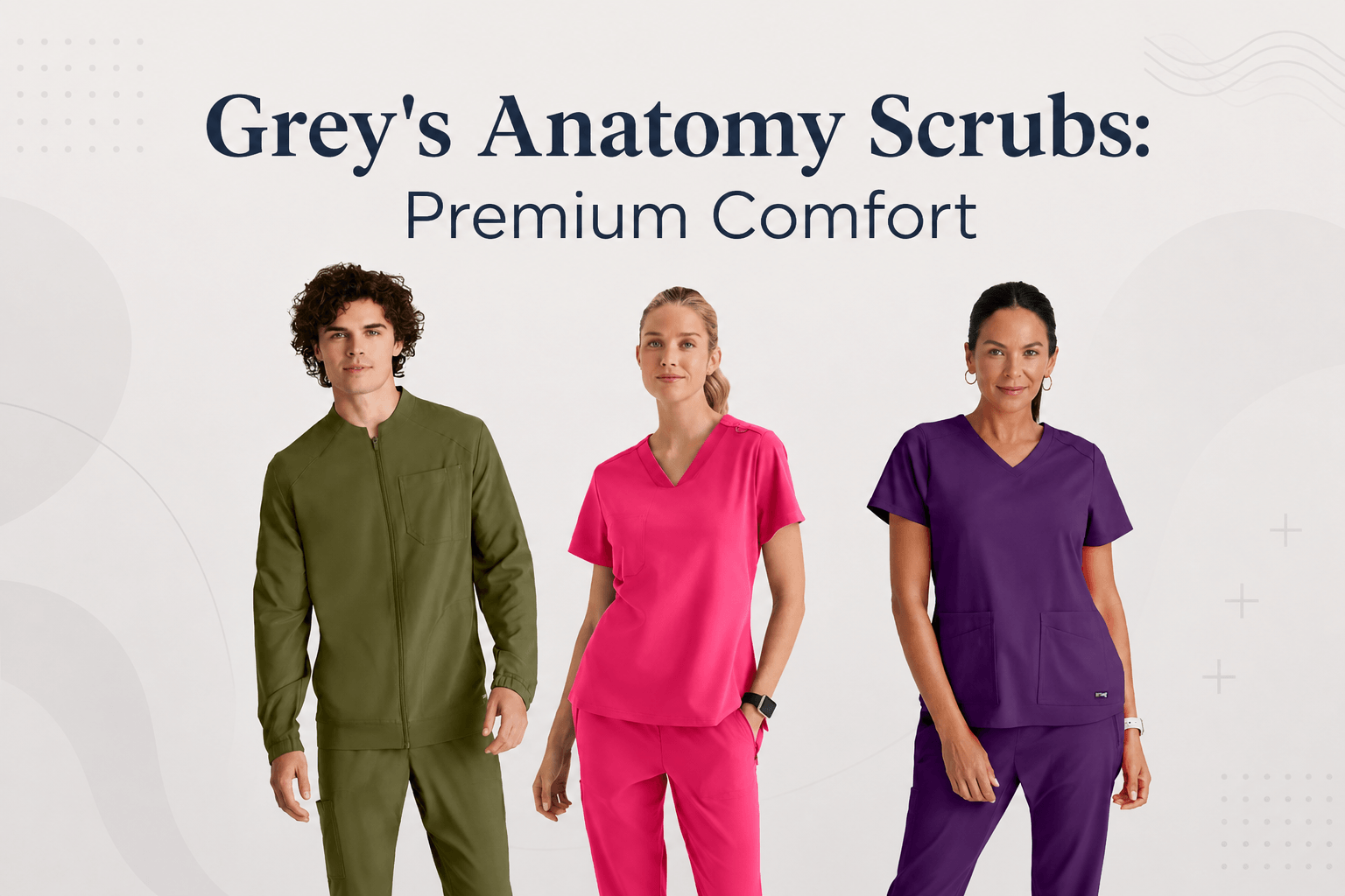 3 models wearing grey's anatomy scrubs in olive, pink and eggplant colour