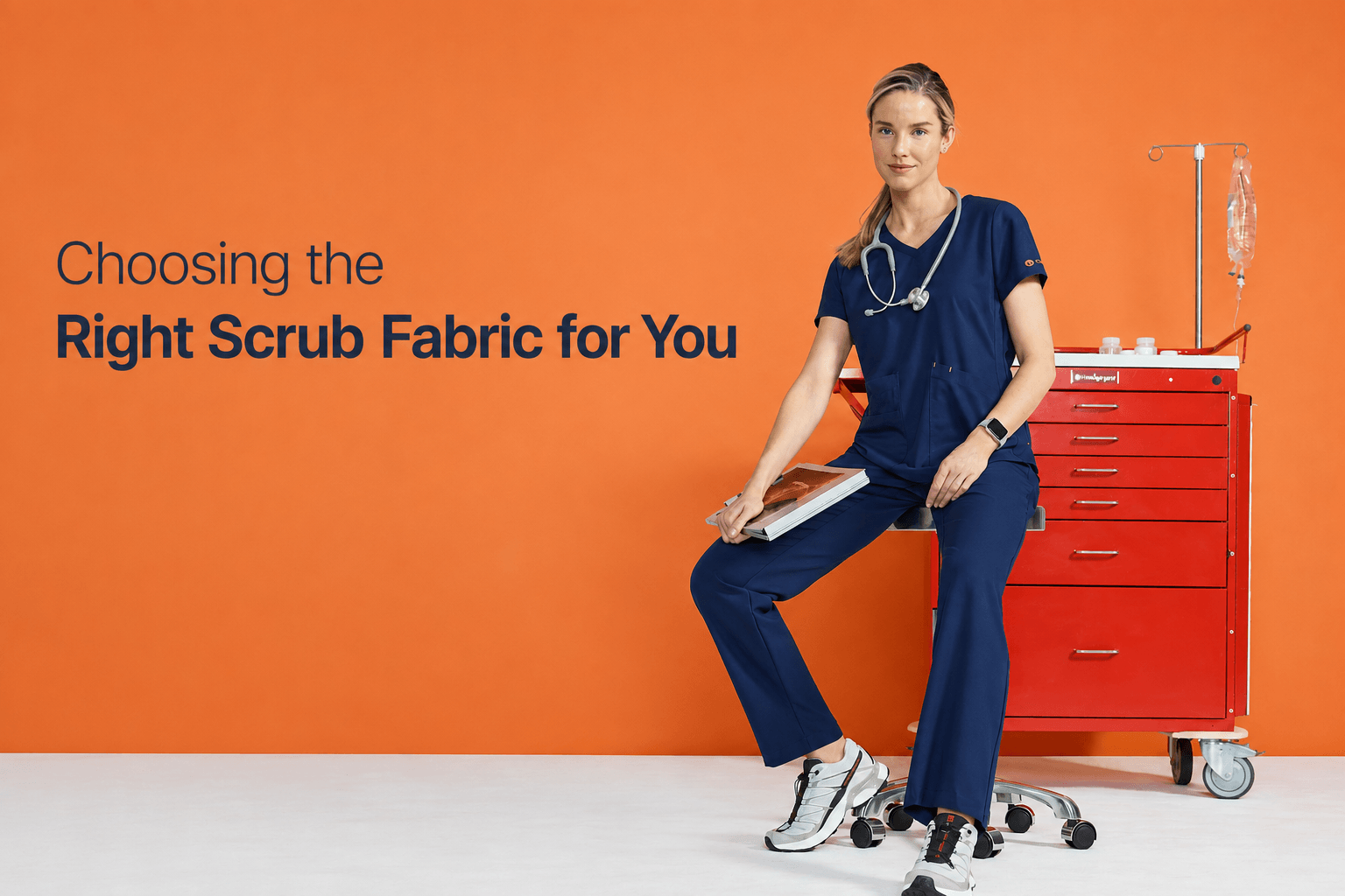 Woman wearing navy blue scrubs seated on swivel table and a text 'Choosing the Right Scrub Fabric for You'
