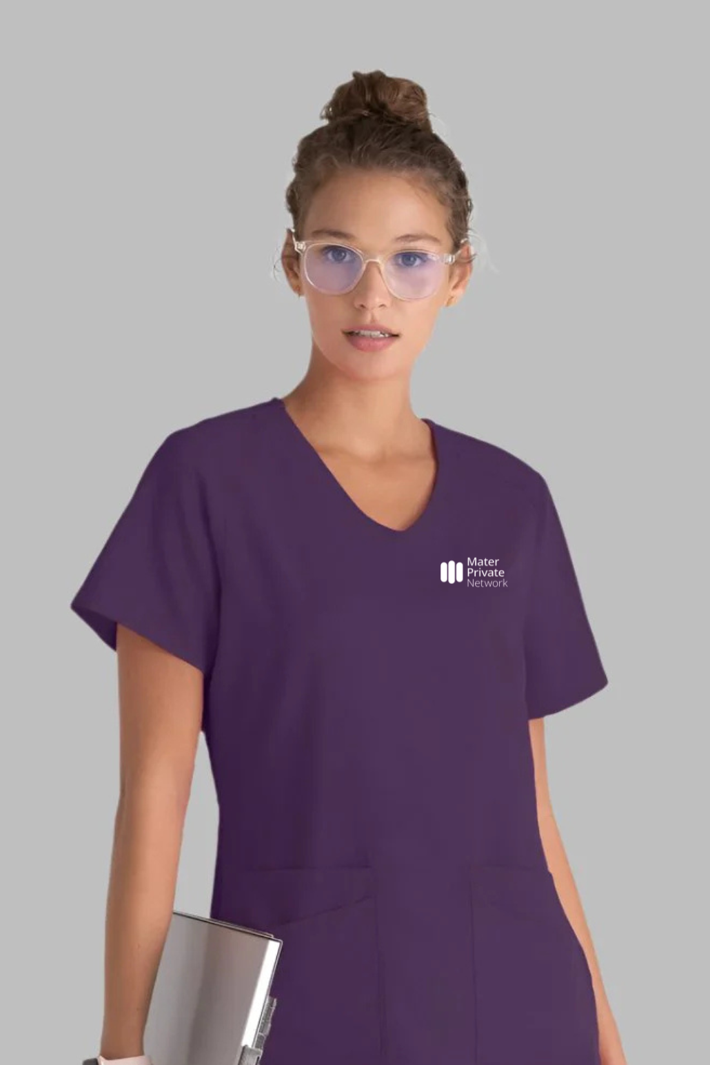 MATER PRIVATE NETWORK LOGO Greys Anatomy Emma 4 pocket, V-neck scrub top with angled seams | Eggplant