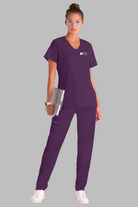 MATER PRIVATE NETWORK LOGO Greys Anatomy Emma 4 pocket, V-neck scrub top with angled seams | Eggplant