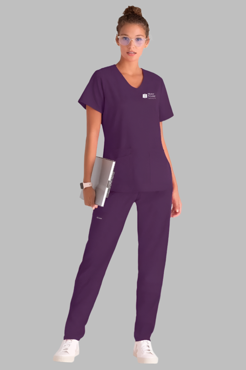MATER PRIVATE NETWORK LOGO Greys Anatomy Emma 4 pocket, V-neck scrub top with angled seams | Eggplant