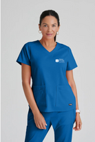 MATER PRIVATE NETWORK LOGO Greys Anatomy Emma 4 pocket, V-neck scrub top with angled seams | New Royal