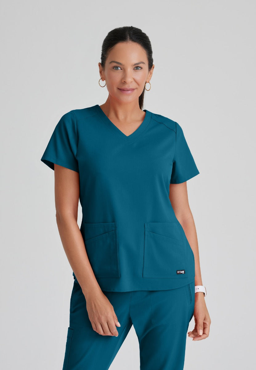 Greys Anatomy Emma 4 pocket, V-neck scrub top with angled seams | Bahama / Caribbean