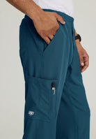 SKECHERS MALE STRUCTURE 4 POCKET ELASTIC WAISTBAND PANT | Caribbean