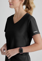 SKECHERS BREEZE 3-POCKET SHAPED HEM TOP | BLACK