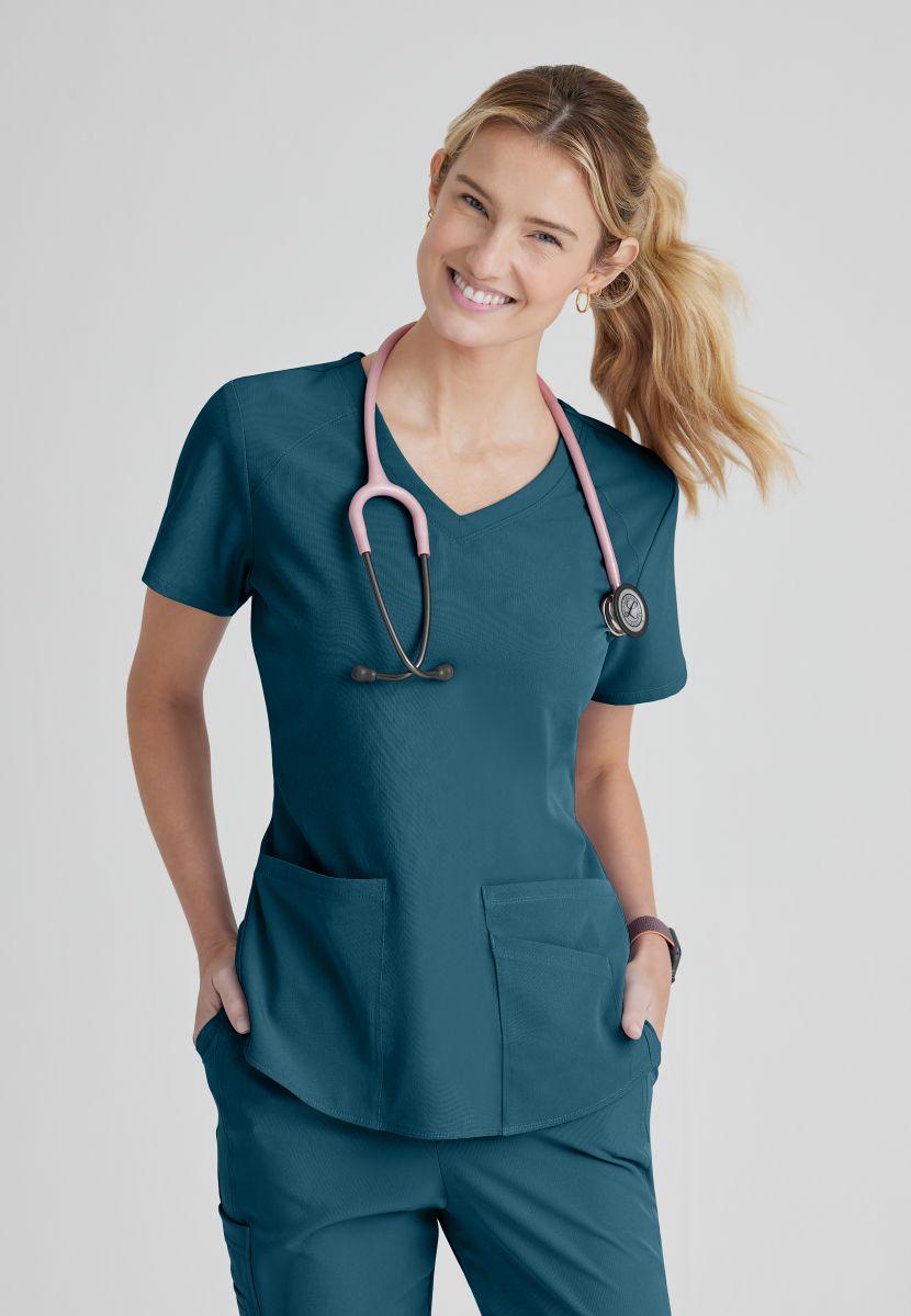 SKECHERS BREEZE 3-POCKET SHAPED HEM TOP | Bahama / Caribbean