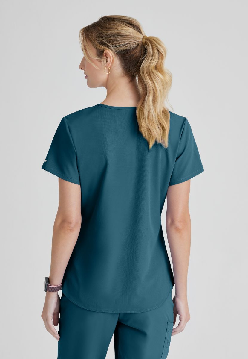 SKECHERS BREEZE 3-POCKET SHAPED HEM TOP | Bahama / Caribbean