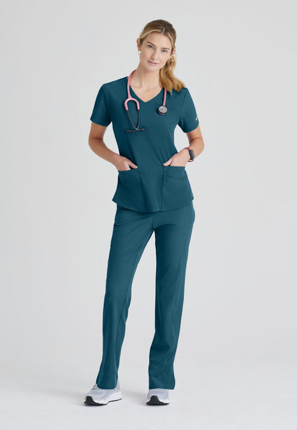 SKECHERS BREEZE 3-POCKET SHAPED HEM TOP | Caribbean