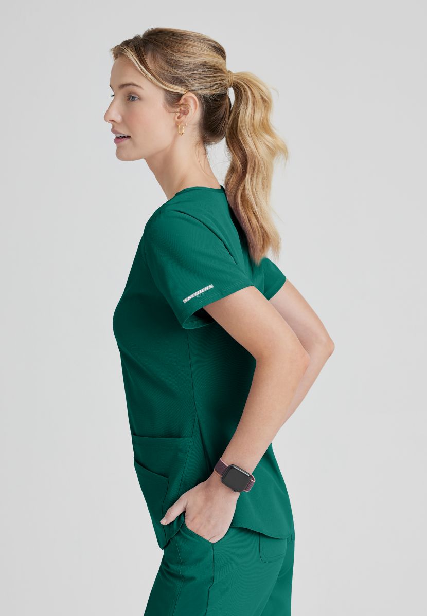 SKECHERS BREEZE 3-POCKET SHAPED HEM TOP | Hunter Green