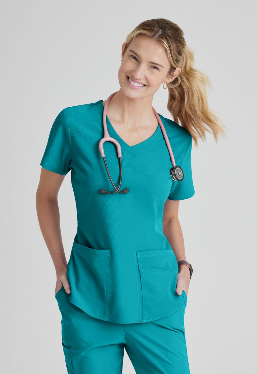 SKECHERS BREEZE 3-POCKET SHAPED HEM TOP | Teal