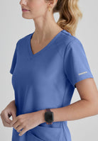 SKECHERS BREEZE 3-POCKET SHAPED HEM TOP | TRUE CEIL
