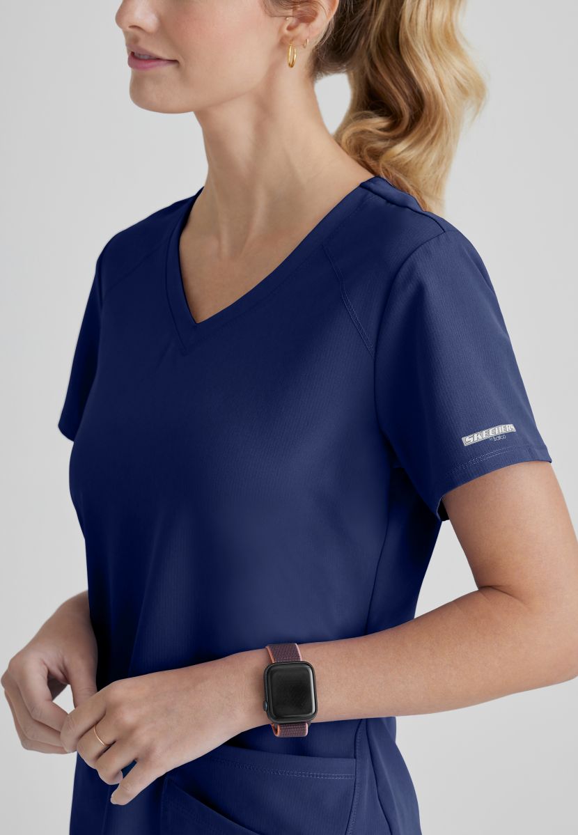 SKECHERS BREEZE 3-POCKET SHAPED HEM TOP | NAVY