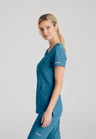 SKECHERS FEMALE RELIANCE 3-POCKET WRAP EFFECT TOP | Bahama / Caribbean